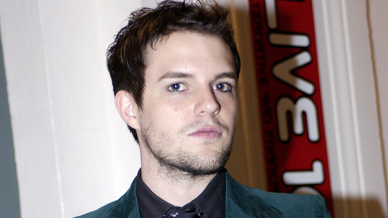 Brandon Flowers looking at camera annoyed