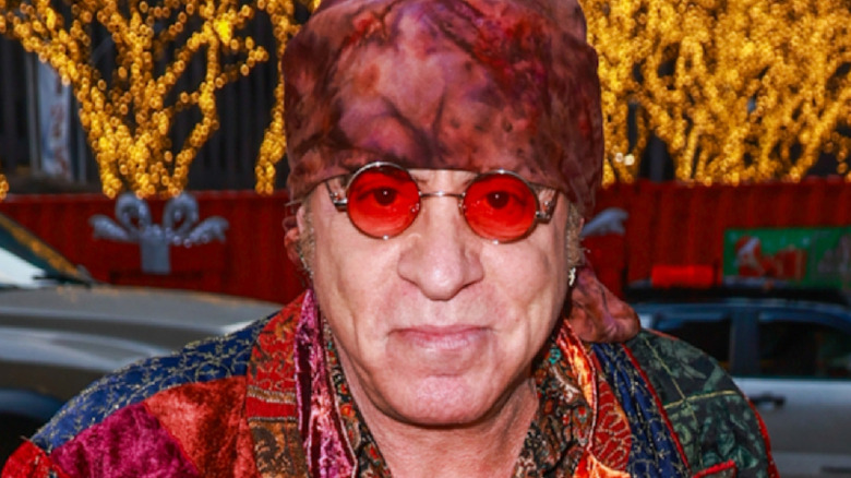 Steven Van Zandt in rose glasses and head scarf