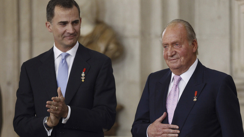 Juan Carlos I and his son at his abdication ceremony