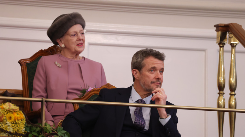 Margrethe II, former Queen of Denmark, seated behind her son after abdicating