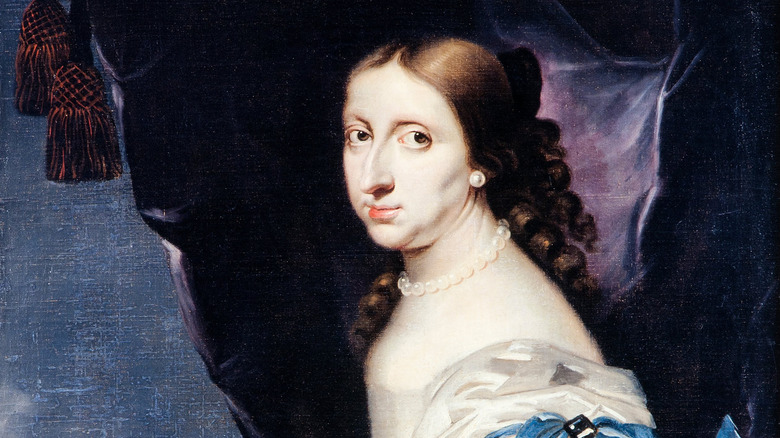 Painting of queen Christina of Sweden wearing pearl necklace and blue dress