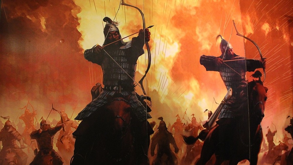 mongol wall mural with warriors holding bow and arrow