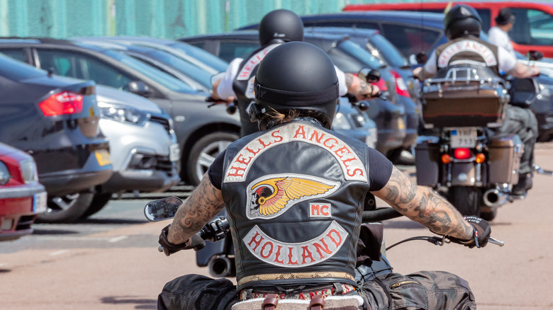 Hells Angel biker riding motorcycle