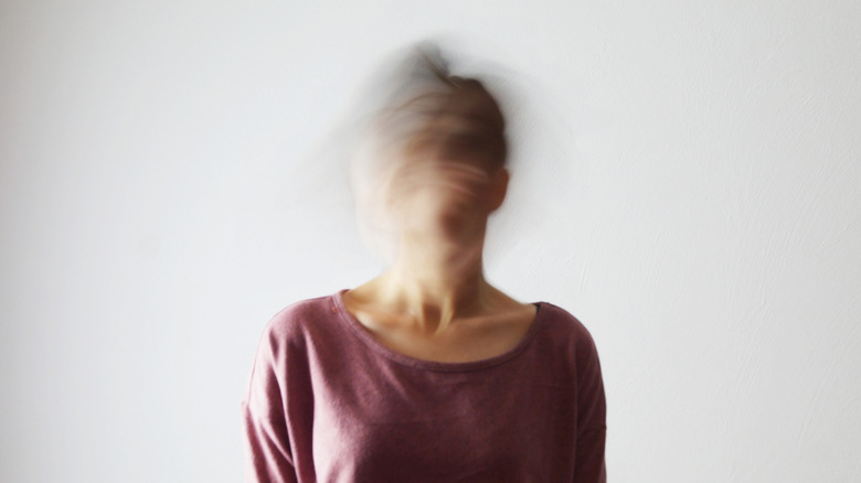 A woman with a blurry face