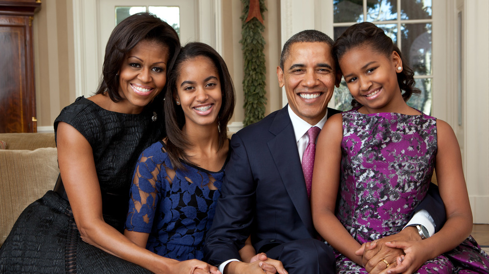 Official portrait by Pete Souza of the Obama family in the Oval Office.