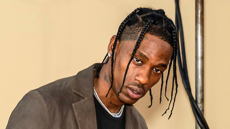 Travis Scott head tilted