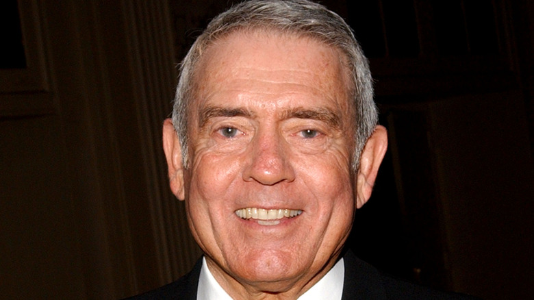 Dan Rather grinning in tuxedo