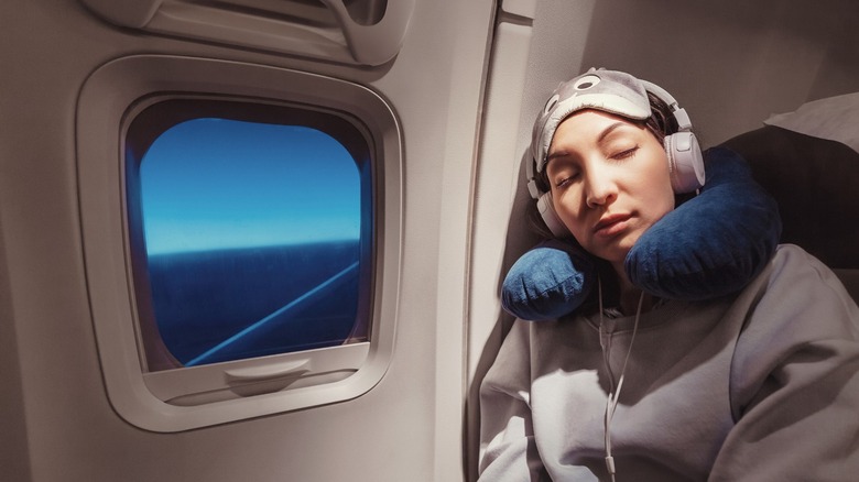 Sleeping woman on airplane