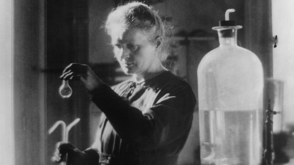 A photograph of scientist Marie Curie at work.