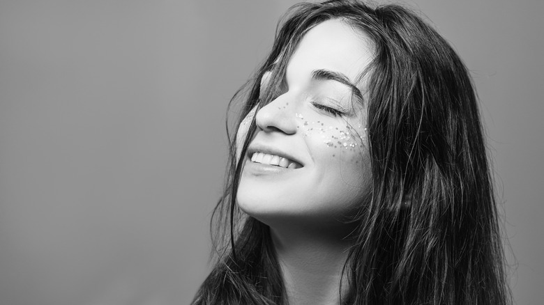 Peaceful woman smiling
