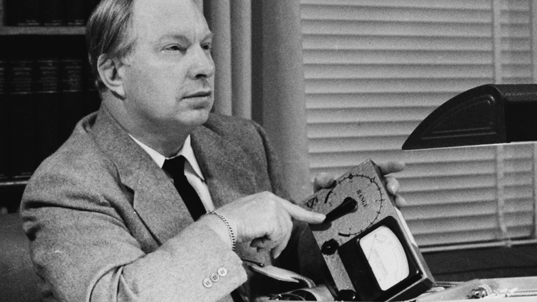 L. Ron Hubbard holding an early e-meter