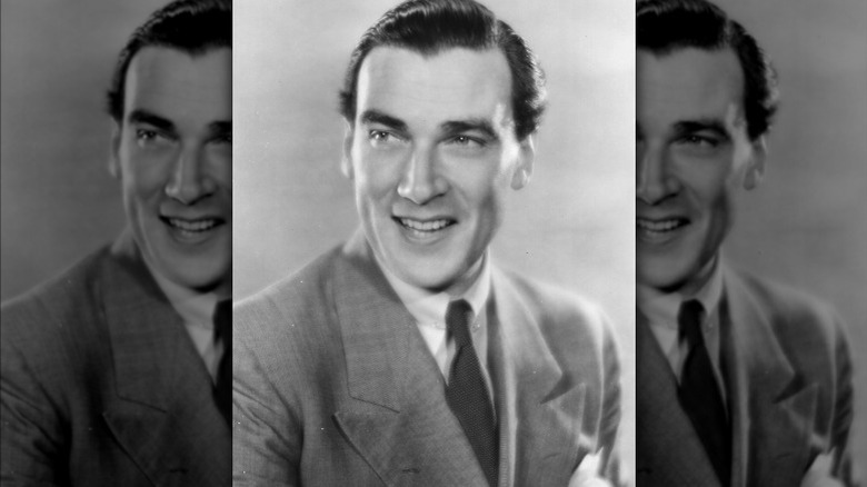 Walter Pidgeon smiling