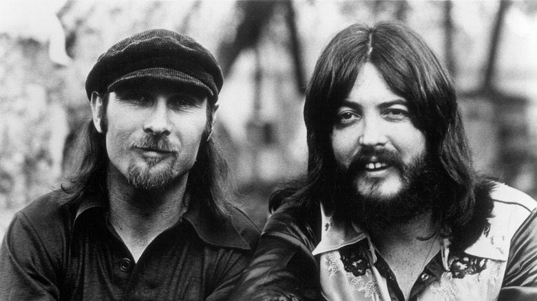 Jim Seals and Dash Crofts smiling for black-and-white promotional shot