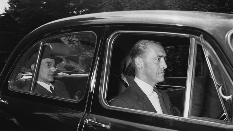 klaus fuchs in back seat of car