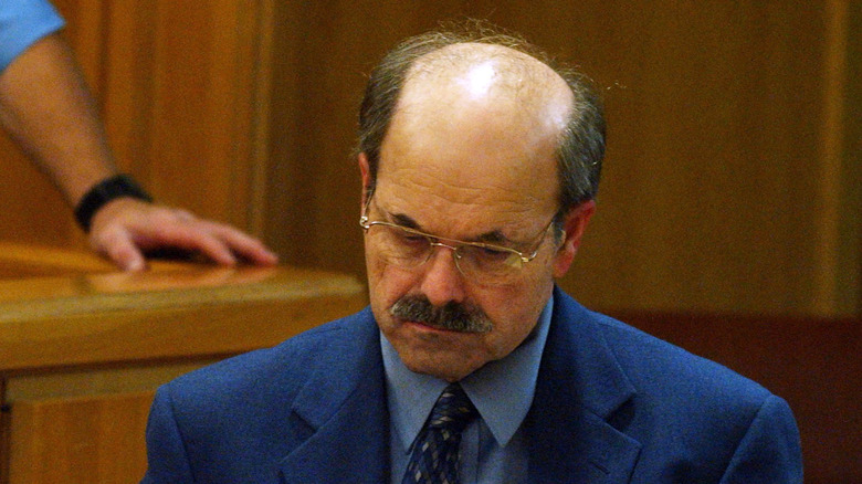 Dennis Rader, the BTK killer, looking down in courtroom