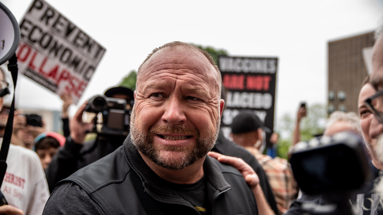 Alex Jones looking constipated at rally
