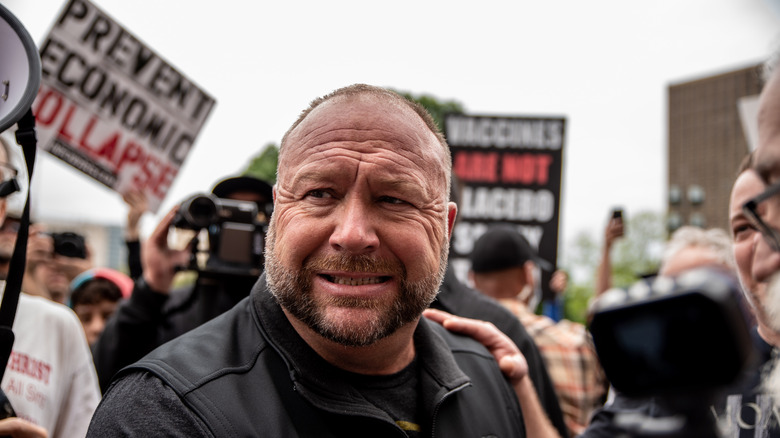 Alex Jones looking constipated at rally