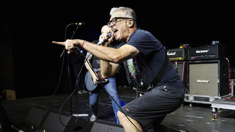 Milo Aukerman of the Descendents singing on stage