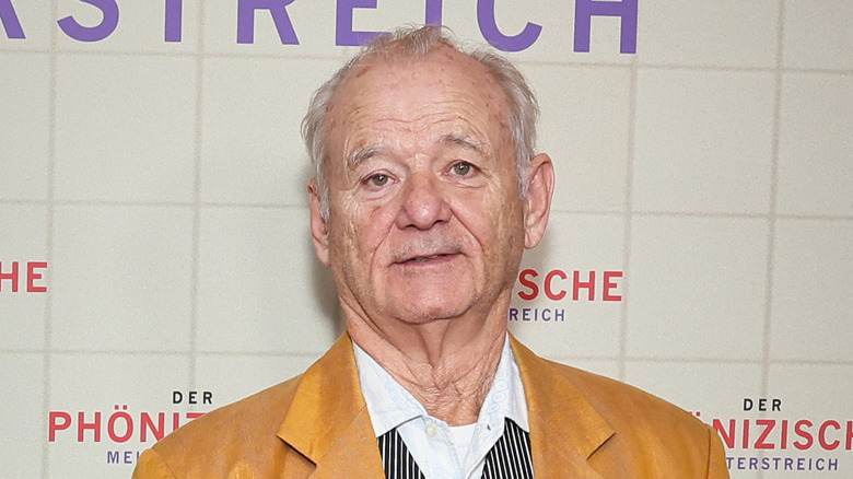 Bill Murray smirking in yellow jacket