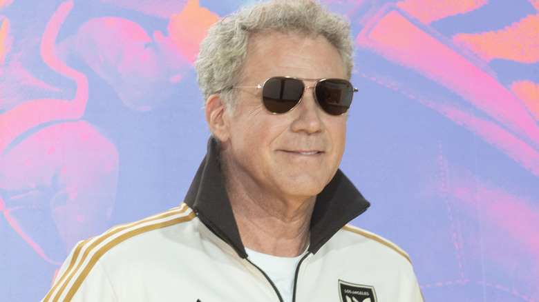 Will Ferrell in sunglasses and soccer warmups