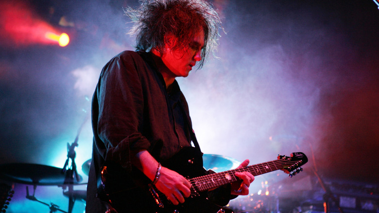 Robert Smith of The Cure singing on stage