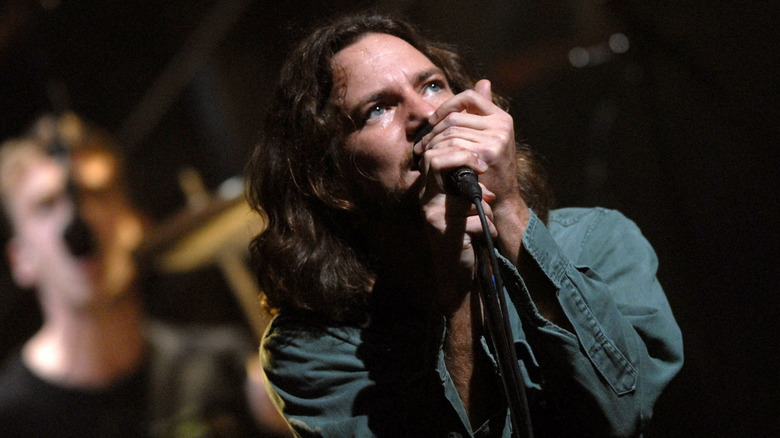 Eddie Vedder singing on stage.