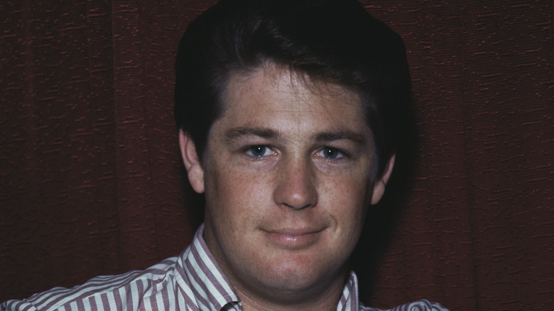 Brian Wilson smirking in 1964