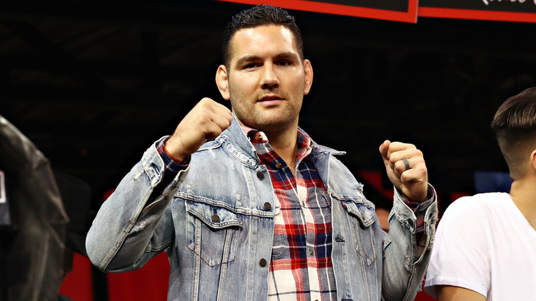 Chris Weidman flexing his fists in 2020