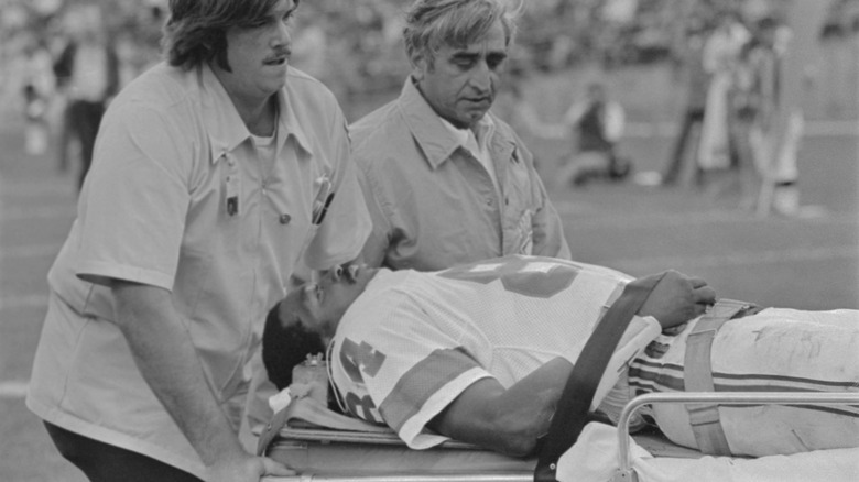 Darryl Stingley being carried off field on stretcher