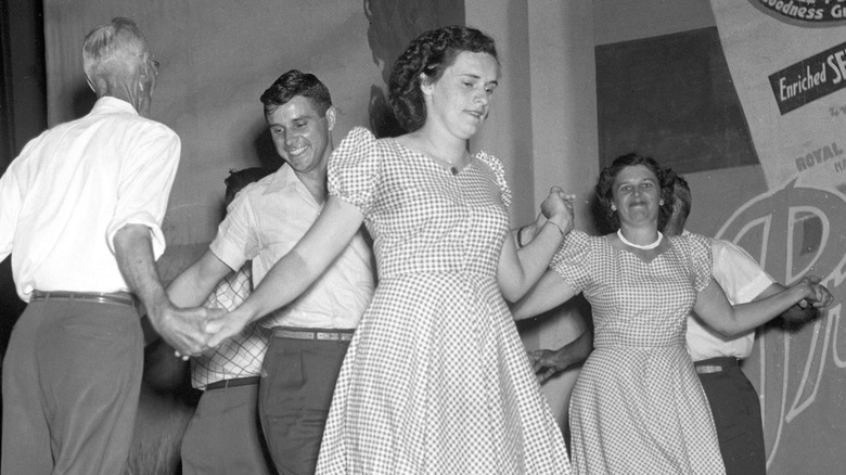 Square dancers spinning