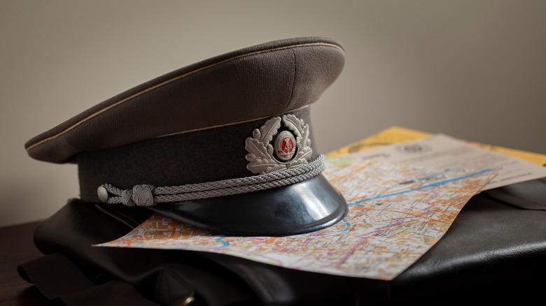 Soviet military hat on map