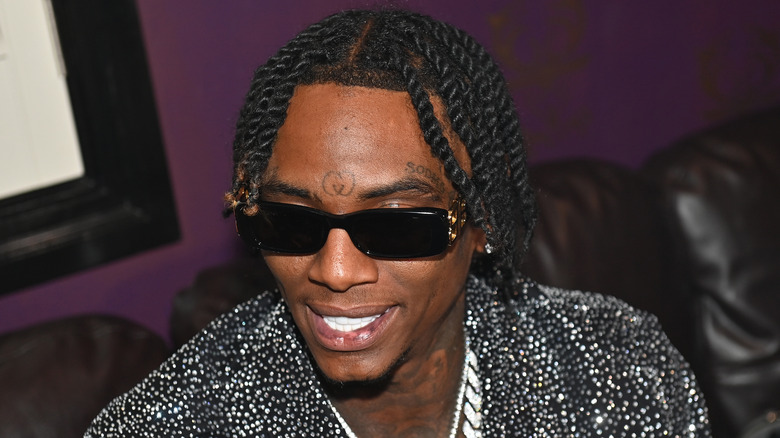 Soulja Boy sunglasses smiling