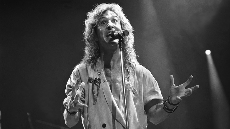 Steve Walsh Kansas onstage at microphone