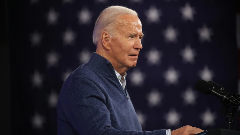 Joe Biden in front of flag
