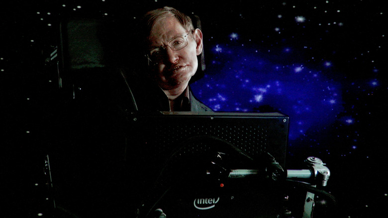 Stephen against dark blue backdrop