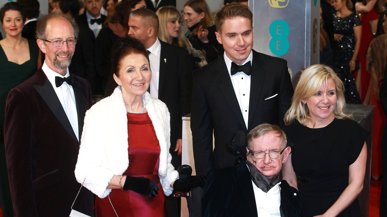 Jonathan standing beside Jane, her children, and Stephen Hawking at the 2015 EE British Academy Film Awards