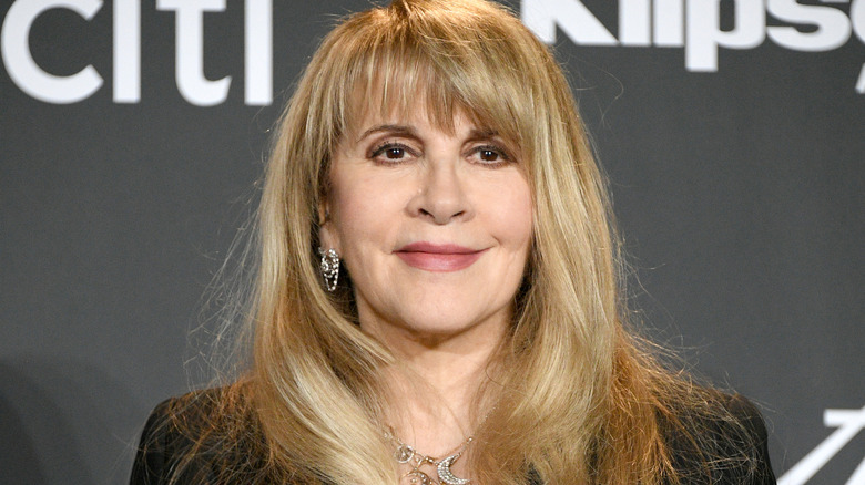 Stevie Nicks smiling to herself