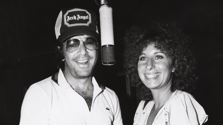 Neil Diamond and Barbra Streisand smiling in recording studio