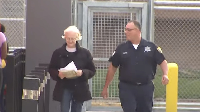 Marilyn Hartman with police officer