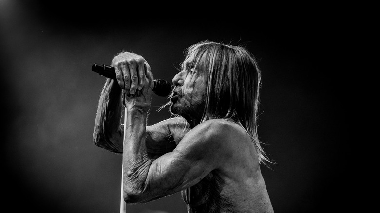 Iggy Pop singing into microphone