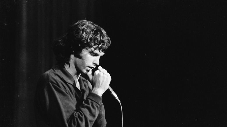 Jim Morrison singing on stage
