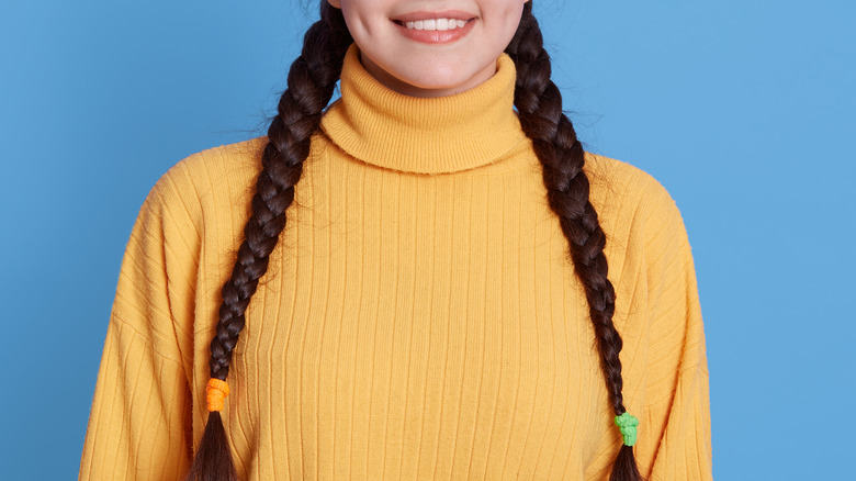 unidentified girl pigtail braids