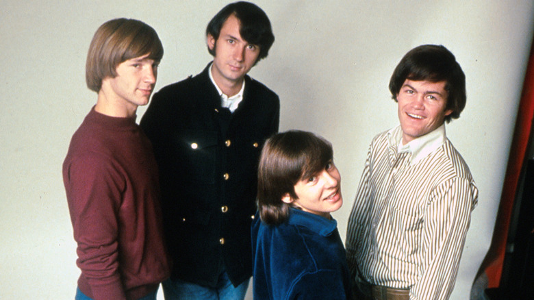 The Monkees against a white backdrop