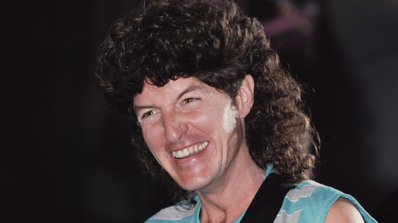 Kevin Cronin laughing onstage in 1980