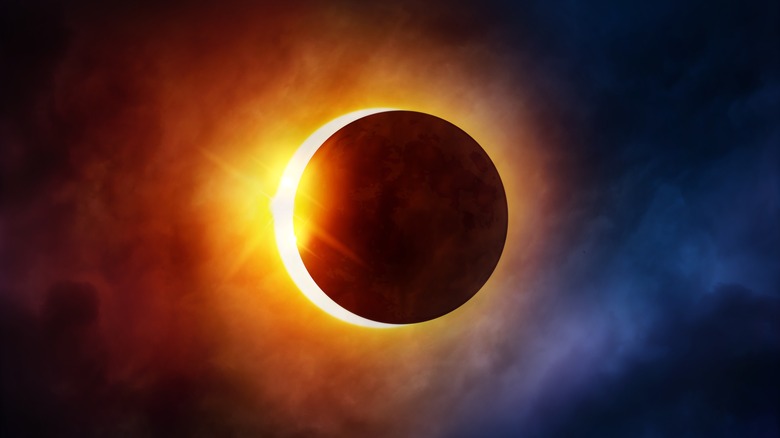 Moon finishing its solar eclipse