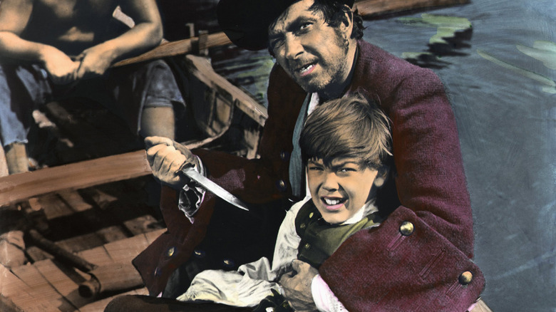 Bobby Driscoll as Jim Hawkins in pirate scene