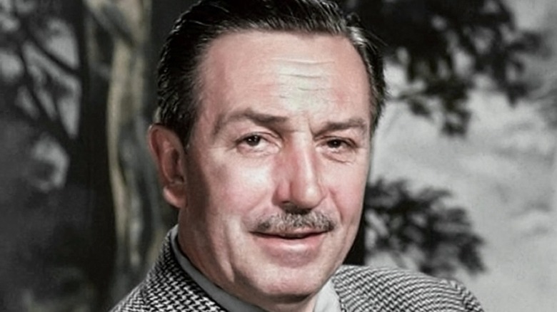 Walt Disney arms crossed