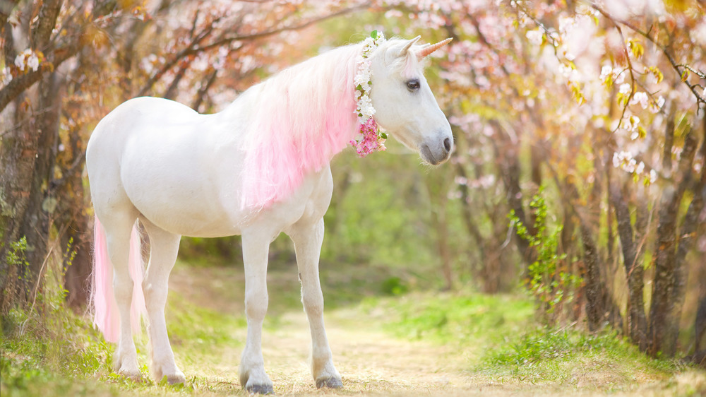 A unicorn with pink mane