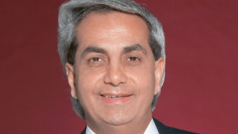 Benny Hinn grinning at camera