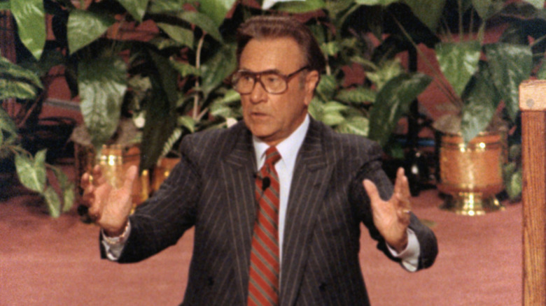 Oral Roberts gesturing during church service